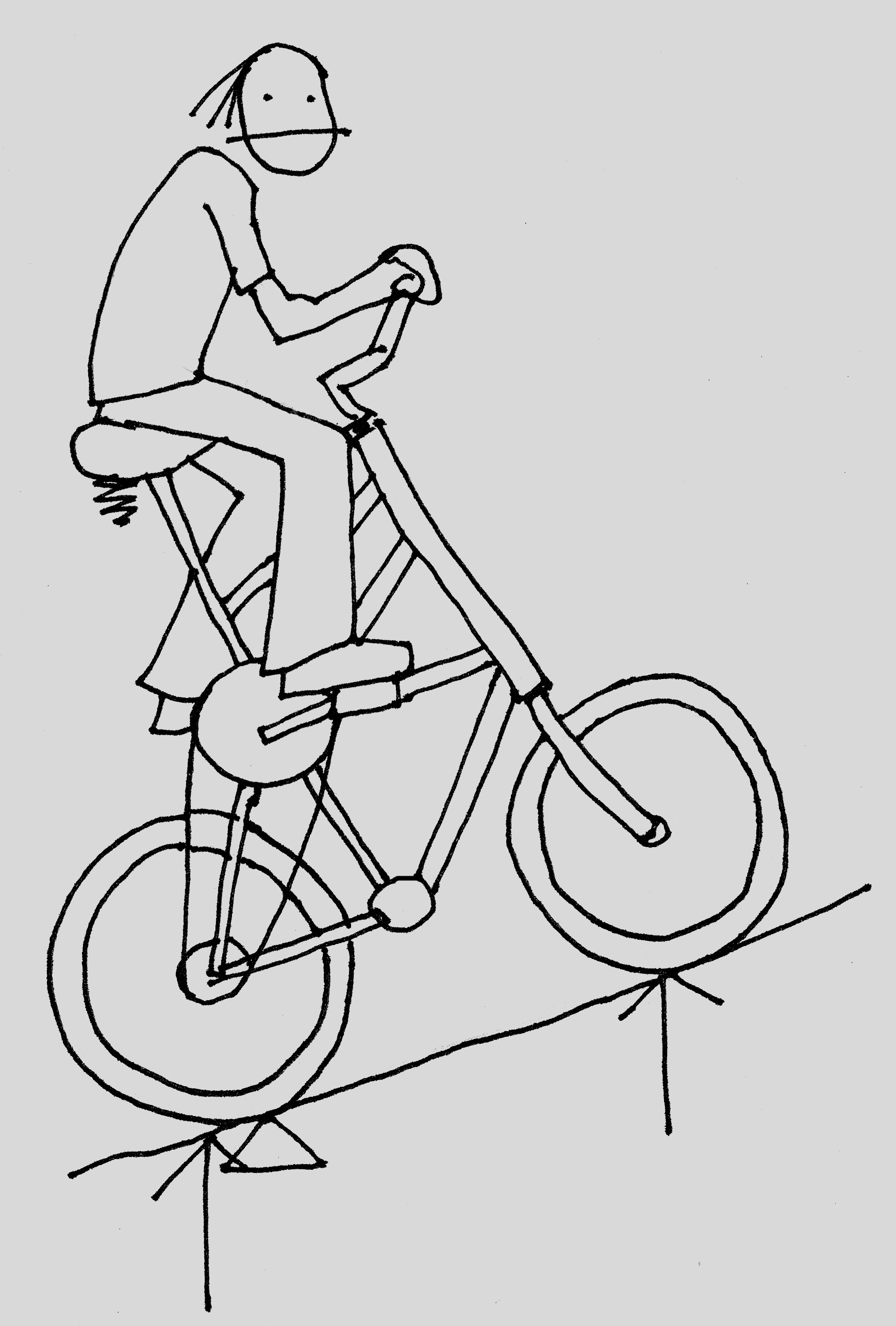 tallbike and rider going uphill, center of gravity dangerously toward the rear wheel